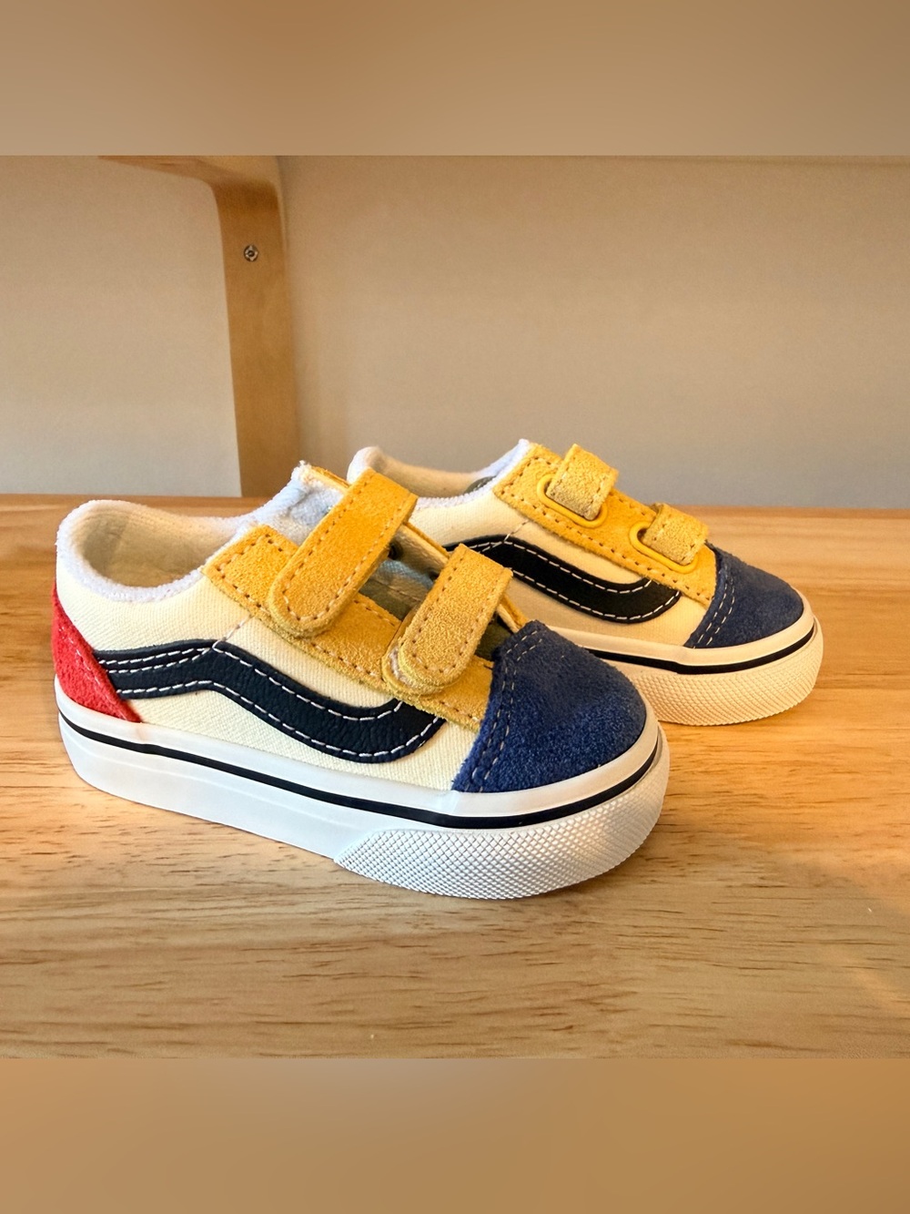 Vans toddler sneaker in Yellow, Navy and White. Size 3.5. Brand new.